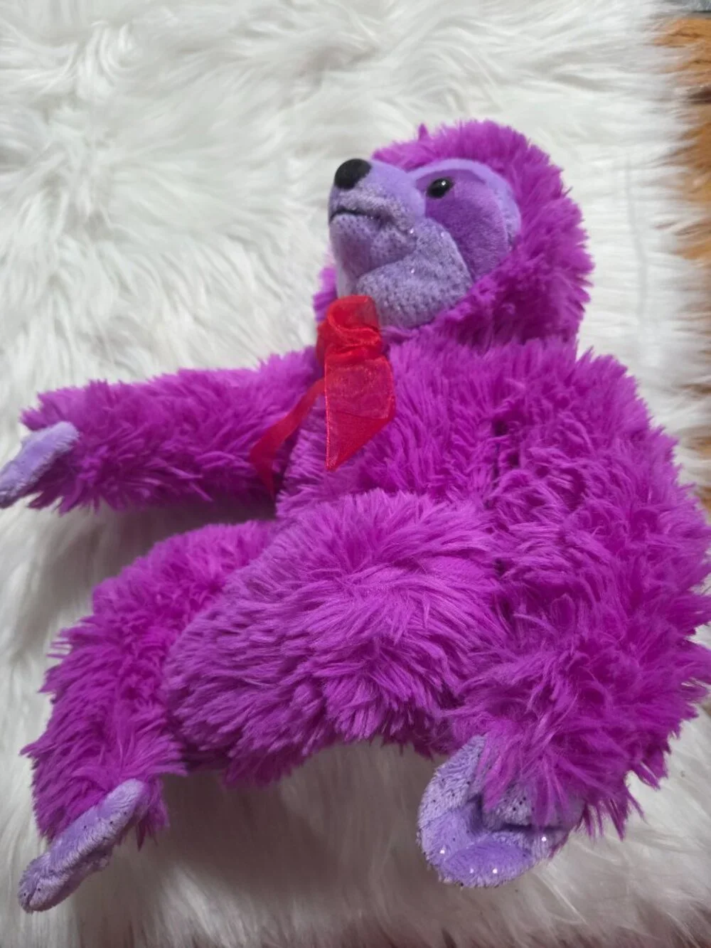 Purple Stuffed Sloth Toy